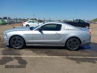2013 Ford Mustang V6 with VIN 1ZVBP8AM4D5212653, listed as a IAAI auction lot 42090402 with 134,437 mi miles. Bid and sale history available at carsss.com. Image 14.