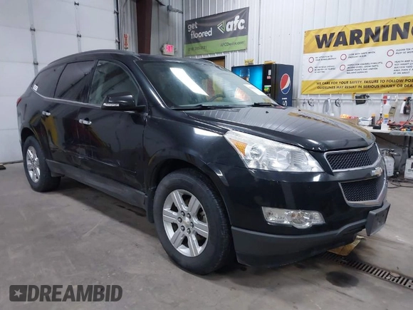 2012 Chevrolet Traverse 1LT z VIN 1GNKVGED8CJ213010, wystawiony jako IAAI lot #41491520 z przebiegiem 185 111 mil mil oraz . Historia ofert i sprzedaży dostępna na DreamBid. Obrazek 1.
