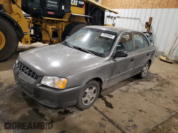 2000 Hyundai Accent z VIN KMHCG45G4YU090520, wystawiony jako Copart lot #79705864 z przebiegiem 145 490 mil mil oraz Szkoda całkowita • Salvage title. Historia ofert i sprzedaży dostępna na DreamBid. Obrazek 1.