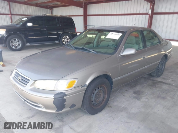 2001 Toyota Camry CE with VIN 4T1BG22K91U117841, listed as a IAAI auction lot 42119599 with 175,725 mi miles. Bid and sale history available at carsss.com. Image 2.