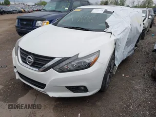 2016 Nissan Altima SR with VIN 1N4AL3AP8GC169495, listed as a IAAI auction lot 41792151 with 131,918 mi miles and . Bid and sale history available at carsss.com. Image 2.