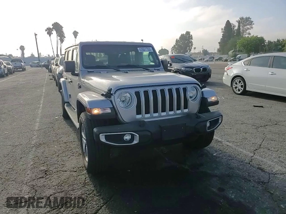 2019 Jeep Wrangler Unlimited Sahara with VIN 1C4HJXEN0KW616942, listed as a Copart auction lot 63501755 with 57,095 mi miles and Salvage title. Bid and sale history available at DreamBid. Image 14.