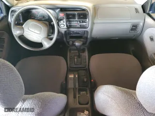 2000 Suzuki Grand Vitara JLX with VIN JS3TD62VXY4110167, listed as a Copart auction lot 77887674 with 126,214 mi miles and Salvage Title. Bid and sale history available at carsss.com. Image 8.
