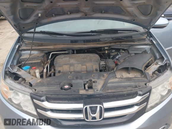 2014 Honda Odyssey Touring with VIN 5FNRL5H91EB081811, listed as a IAAI auction lot 42153920 with 16 mi miles and . Bid and sale history available at DreamBid. Image 10.