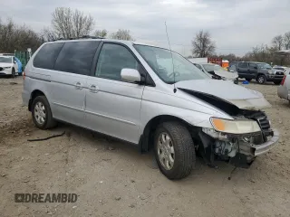 2004 Honda Odyssey EX-L with VIN 5FNRL18904B005231, listed as a Copart auction lot 50929815 with Not Provided miles and Salvage Title. Bid and sale history available at DreamBid. Image 4.