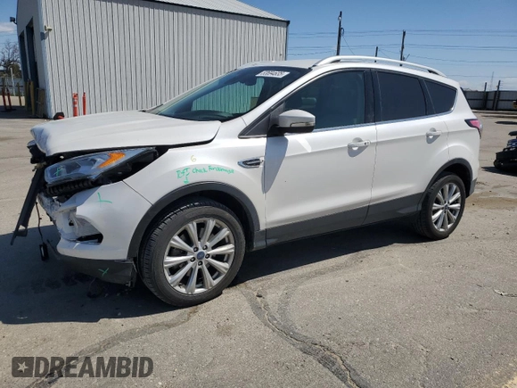 2017 Ford Escape Titanium with VIN 1FMCU9J90HUD28716, listed as a Copart auction lot 53694635 with 90,484 mi miles and Salvage Title. Bid and sale history available at carsss.com. Image 1.
