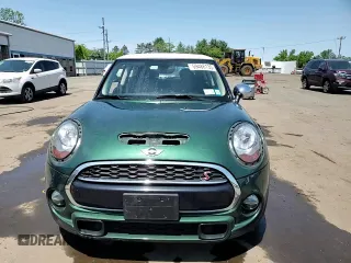 2017 MINI Hardtop Cooper S z VIN WMWXP7C57H3B93817, wystawiony jako Copart lot #59488135 z przebiegiem 68 596 mil mil oraz Szkoda całkowita • Salvage title. Historia ofert i sprzedaży dostępna na DreamBid. Obrazek 14.