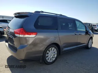 2014 Toyota Sienna XLE z VIN 5TDYK3DC7ES452163, wystawiony jako Copart lot #57534605 z przebiegiem 174 794 mil mil oraz Szkoda całkowita • Salvage title. Historia ofert i sprzedaży dostępna na DreamBid. Obrazek 3.