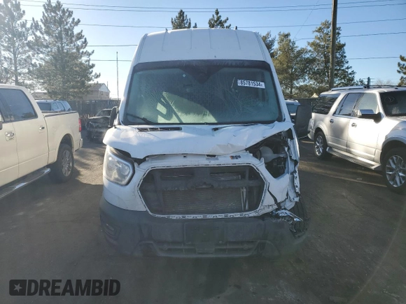2024 Ford Transit Cargo with VIN 1FTBW3U86RKB32433, listed as a Copart auction lot 85781534 with 15,889 mi miles and Salvage Title. Bid and sale history available at DreamBid. Image 5.