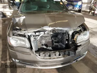 2014 Chrysler 300 C z VIN 2C3CCAKG6EH273214, wystawiony jako IAAI lot #41656641 z przebiegiem 211 121 mil mil oraz . Historia ofert i sprzedaży dostępna na DreamBid. Obrazek 6.