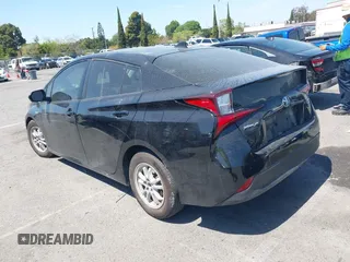 2019 Toyota Prius L Eco with VIN JTDKARFU0K3087064, listed as a IAAI auction lot 41986365 with 81,735 mi miles. Bid and sale history available at carsss.com. Image 3.