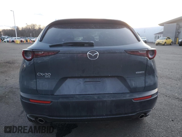 2023 Mazda CX-30 S Carbon Edition с VIN 3MVDMBCM3PM500403, выставлен на аукционе Copart как лот 88146095 с пробегом 29 861 миль миль и Списание • Salvage title. История ставок и продаж доступна на DreamBid. Изображение 6.