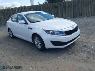 2011 Kia Optima LX with VIN KNAGM4A76B5175443, listed as a IAAI auction lot 42041194 with 121,530 mi miles. Bid and sale history available at carsss.com. Image 1.