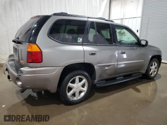 2007 GMC Envoy SLE z VIN 1GKDT13S172268778, wystawiony jako Copart lot #86169804 z przebiegiem 109 164 mil mil oraz Szkoda całkowita • Salvage title. Historia ofert i sprzedaży dostępna na DreamBid. Obrazek 3.
