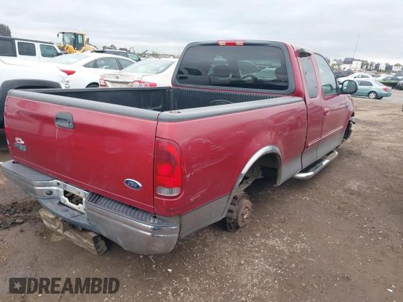 2002 Ford F-150 XL with VIN 1FTRX17W72NB88475, listed as a IAAI auction lot 41574244 with 200,396 mi miles. Bid and sale history available at carsss.com. Image 4.