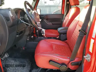 2016 Jeep Wrangler Unlimited Sport with VIN 1C4BJWDG2GL235220, listed as a Copart auction lot 48978005 with 126,863 mi miles and Salvage Title. Bid and sale history available at DreamBid. Image 7.