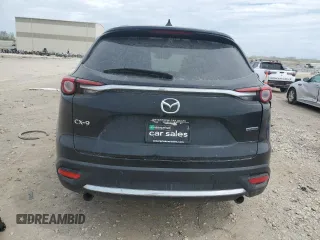 2021 Mazda CX-9 Carbon Edition z VIN JM3TCADY9M0514372, wystawiony jako Copart lot #52902555 z przebiegiem 99 812 mil mil oraz Szkoda całkowita • Salvage title. Historia ofert i sprzedaży dostępna na DreamBid. Obrazek 6.