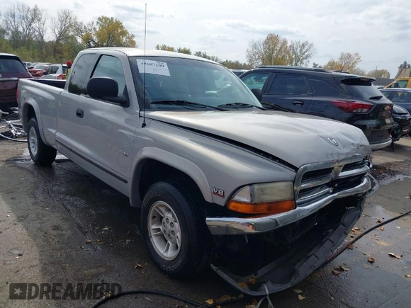 1998 Dodge Dakota SLT with VIN 1B7GL22Y5WS736756, listed as a IAAI auction lot 40687209 with 141,560 mi miles. Bid and sale history available at carsss.com. Image 1.
