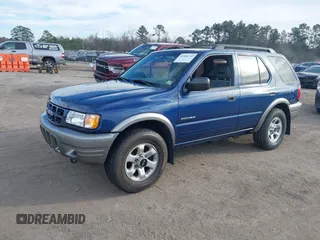 2002 Isuzu Rodeo S with VIN 4S2CK58W324306607, listed as a IAAI auction lot 41466742 with 158,540 mi miles and . Bid and sale history available at DreamBid. Image 2.