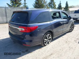 2020 Honda Odyssey Elite with VIN 5FNRL6H95LB052590, listed as a IAAI auction lot 42231280 with 65,165 mi miles and . Bid and sale history available at DreamBid. Image 4.