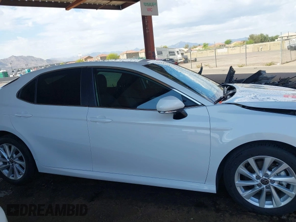 2024 Toyota Camry LE z VIN 4T1C11AK4RU864390, wystawiony jako IAAI lot #42212311 z przebiegiem 17 107 mil mil oraz . Historia ofert i sprzedaży dostępna na DreamBid. Obrazek 13.