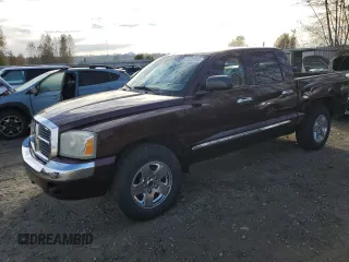 2005 Dodge Dakota Laramie with VIN 1D7HW58NX5S248188, listed as a Copart auction lot 75443734 with 209,716 mi miles and Salvage Title. Bid and sale history available at DreamBid. Image 1.