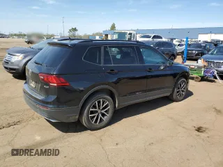 2021 Volkswagen Tiguan S z VIN 3VV0B7AX0MM068396, wystawiony jako Copart lot #54058005 z przebiegiem 42 103 mil mil oraz Czysty tytuł • Clean title. Historia ofert i sprzedaży dostępna na DreamBid. Obrazek 3.