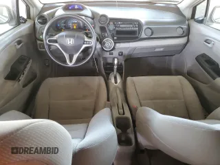 2013 Honda Insight with VIN JHMZE2H3XDS003838, listed as a Copart auction lot 52220235 with 144,729 mi miles and Salvage title. Bid and sale history available at DreamBid. Image 8.