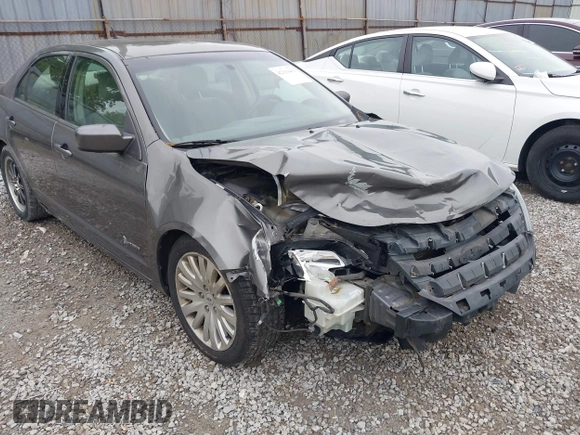 2011 Ford Fusion Hybrid with VIN 3FADP0L39BR345250, listed as a IAAI auction lot 42319401 with 321,317 mi miles and . Bid and sale history available at DreamBid. Image 6.