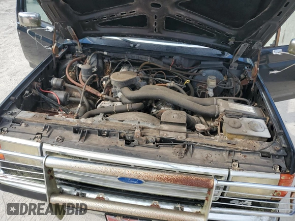 1988 Ford Bronco Custom с VIN 1FMEU15H4JLA87668, выставлен на аукционе Copart как лот 71630614 с пробегом 76 473 миль миль и Чистый • Clean title. История ставок и продаж доступна на DreamBid. Изображение 11.