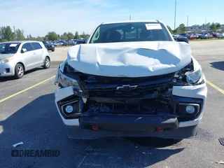2021 Chevrolet Colorado 2WD LT z VIN 1GCGSCEN3M1276560, wystawiony jako IAAI lot #41442039 z przebiegiem 82 538 mil mil oraz . Historia ofert i sprzedaży dostępna na DreamBid. Obrazek 6.