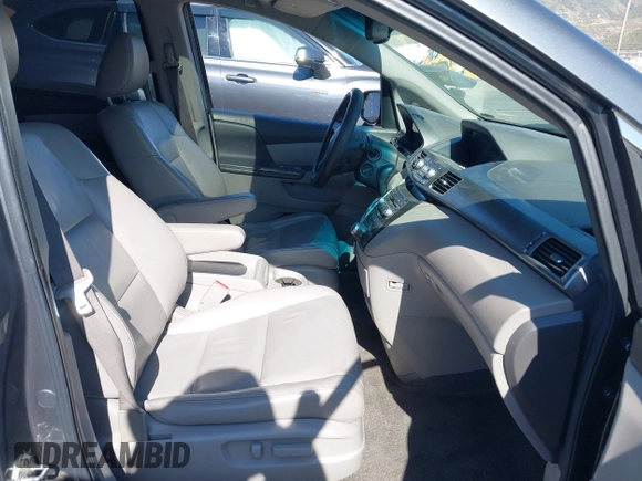 2011 Honda Odyssey Touring with VIN 5FNRL5H96BB009580, listed as a IAAI auction lot 42202595 with Not provided miles and . Bid and sale history available at DreamBid. Image 5.