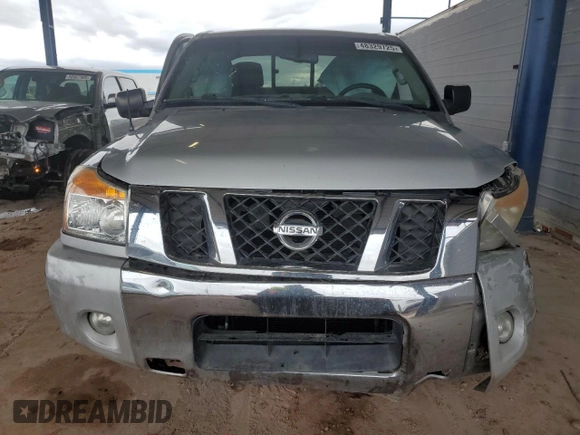 2012 Nissan Titan SE with VIN 1N6AA0CA9CN301960, listed as a Copart auction lot 48329725 with Not Provided miles and Salvage Title. Bid and sale history available at carsss.com. Image 5.