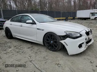 2014 BMW 6 Series 650i xDrive z VIN WBA6B4C54ED371324, wystawiony jako Copart lot #49016325 z przebiegiem 113 395 mil mil oraz Szkoda całkowita • Salvage title. Historia ofert i sprzedaży dostępna na DreamBid. Obrazek 4.