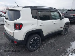 2015 Jeep Renegade Trailhawk with VIN ZACCJBCT5FPB91056, listed as a IAAI auction lot 41609659 with 145,109 mi miles and . Bid and sale history available at DreamBid. Image 4.