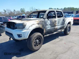 2014 Toyota Tacoma with VIN 5TFLU4EN0EX098815, listed as a IAAI auction lot 41675606 with 89,365 mi miles. Bid and sale history available at carsss.com. Image 2.