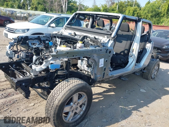 2022 Jeep Gladiator Willys with VIN 1C6HJTAG0NL131004, listed as a IAAI auction lot 40307060 with Not provided miles and . Bid and sale history available at DreamBid. Image 18.
