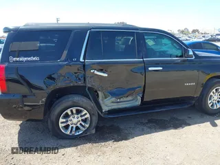 2015 Chevrolet Tahoe LT with VIN 1GNSCBKC8FR612607, listed as a IAAI auction lot 42099907 with 138,037 mi miles and . Bid and sale history available at DreamBid. Image 6.