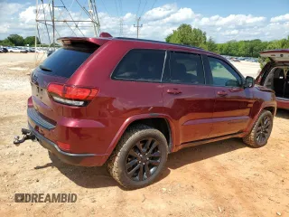 2017 Jeep Grand Cherokee Altitude with VIN 1C4RJEAG9HC702924, listed as a Copart auction lot 57897805 with 133,796 mi miles and Salvage title. Bid and sale history available at DreamBid. Image 3.