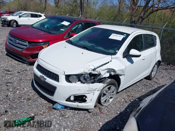 2016 Chevrolet Sonic LT with VIN 1G1JC6SH2G4134831, listed as a IAAI auction lot 41983302 with 85,828 mi miles. Bid and sale history available at carsss.com. Image 2.