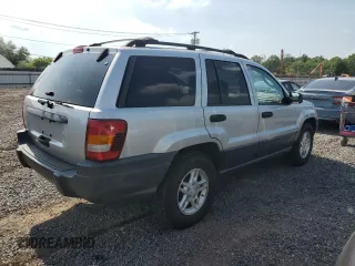 2004 Jeep Grand Cherokee Laredo with VIN 1J4GW48S44C282992, listed as a Copart auction lot 61523685 with 112,486 mi miles and Clean title. Bid and sale history available at DreamBid. Image 3.