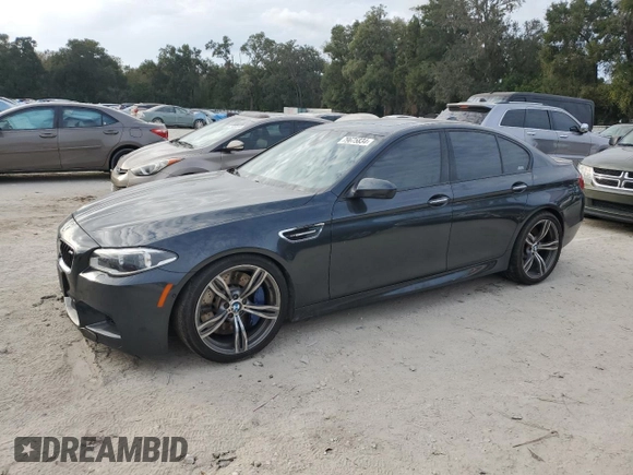 2016 BMW M5 z VIN WBSFV9C51GD595430, wystawiony jako Copart lot #79675834 z przebiegiem 82 351 mil mil oraz Szkoda całkowita • Salvage title. Historia ofert i sprzedaży dostępna na DreamBid. Obrazek 1.