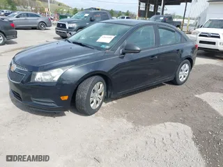 2013 Chevrolet Cruze LS with VIN 1G1PA5SH9D7163098, listed as a IAAI auction lot 42015408 with 202,184 mi miles. Bid and sale history available at carsss.com. Image 2.