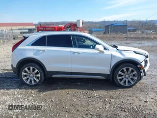 2020 Cadillac XT4 AWD Premium Luxury z VIN 1GYFZDR45LF016381, wystawiony jako IAAI lot #41556874 z przebiegiem 23 887 mil mil oraz . Historia ofert i sprzedaży dostępna na DreamBid. Obrazek 13.