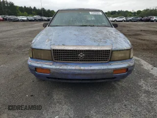 1991 Plymouth Acclaim z VIN 1P3XA4633MF523214, wystawiony jako Copart lot #55908665 z przebiegiem 90 332 mil mil oraz Tytuł czysty. Historia ofert i sprzedaży dostępna na DreamBid. Obrazek 5.