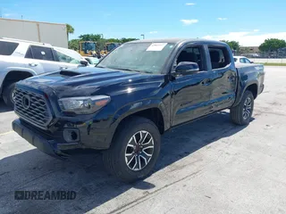 2021 Toyota Tacoma SR5 с VIN 3TMAZ5CN5MM148579, выставлен на аукционе IAAI как лот 42827117 с пробегом Не указан миль и . История ставок и продаж доступна на DreamBid. Изображение 2.