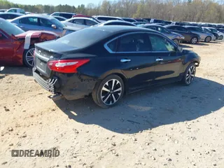 2018 Nissan Altima SR with VIN 1N4AL3AP9JC228304, listed as a IAAI auction lot 41883035 with 53,168 mi miles and . Bid and sale history available at DreamBid. Image 4.