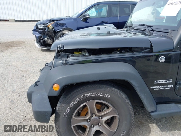 2016 Jeep Wrangler Unlimited Sport with VIN 1C4HJWDG3GL342108, listed as a IAAI auction lot 41927879 with 88,801 mi miles and . Bid and sale history available at DreamBid. Image 17.