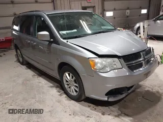 2014 Dodge Grand Caravan SXT with VIN 2C4RDGCGXER263963, listed as a IAAI auction lot 41956264 with 138,815 mi miles and . Bid and sale history available at DreamBid. Image 1.