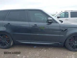 2018 Land Rover Range Rover Sport z VIN SALWR2RE3JA182033, wystawiony jako IAAI lot #41888457 z przebiegiem 103 941 mil mil oraz . Historia ofert i sprzedaży dostępna na DreamBid. Obrazek 13.